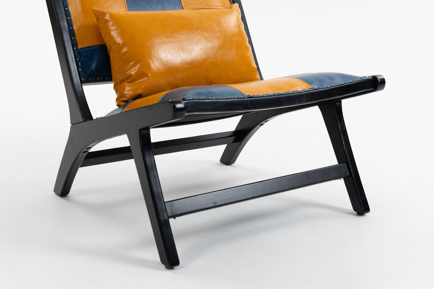 Modern Boho Accent Chair with orange leather cushions and blue upholstery, black frame on Tampa Home & Garden Store