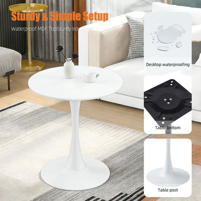 White round dining table with tulip-style pedestal base in a modern living room on Tampa Home & Garden Store