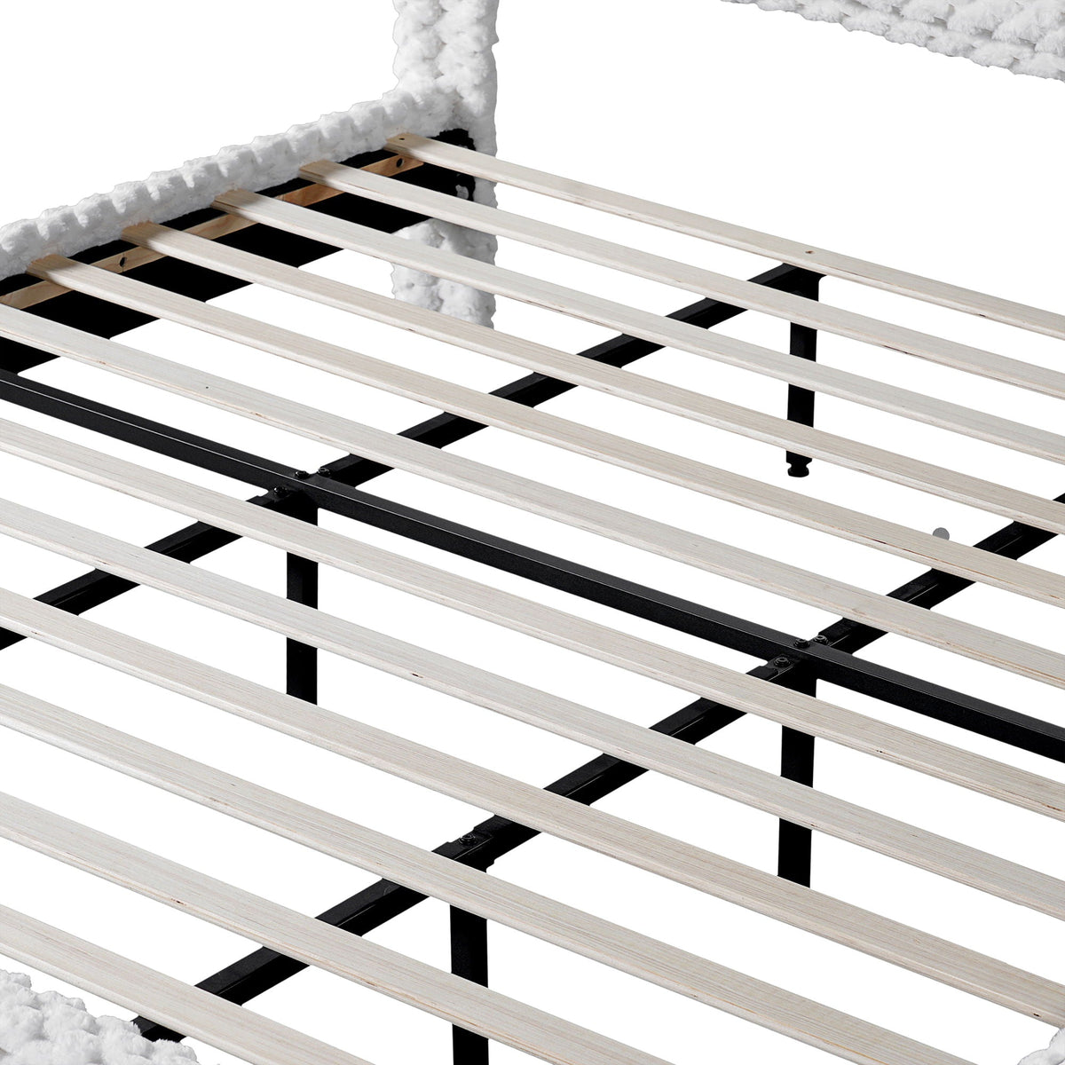 Slatted bed base with light wood slats and black metal frame on Tampa Home & Garden Store