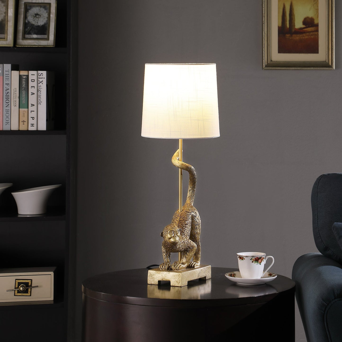 24-Inch Old World Gold Capuchin Monkey Polyresin Table Lamp by HouseOfZazla with a gold monkey sculpture and white fabric shade on Tampa Home & Garden Store