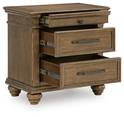 Karallin three-drawer nightstand in medium brown wood with dark metal pulls and bun feet on Tampa Home & Garden Store