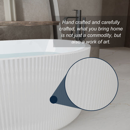 Modern double wall freestanding soaker tub with ribbed exterior and matte black faucet on Tampa Home & Garden Store