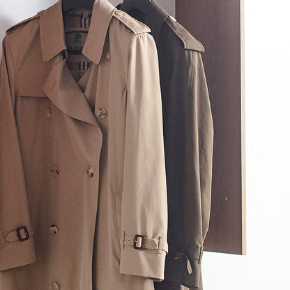 Wall Mounted Wood Closet System with modular units in light brown; coats hang from it on Tampa Home & Garden Store