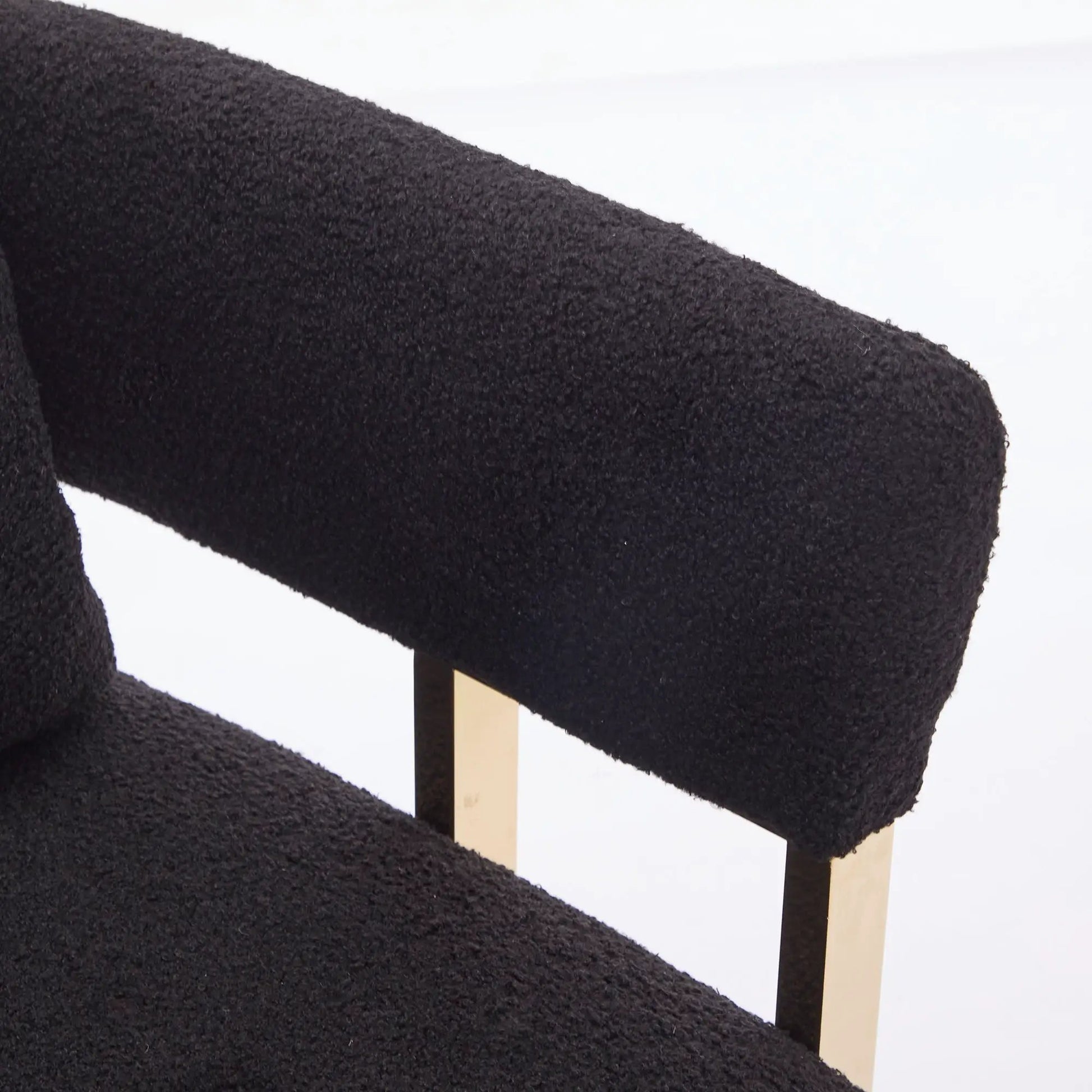 Pair of modern chairs with teddy fleece upholstery and light wood legs with metal feet on Tampa Home & Garden Store