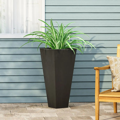 Outdoor Modern Cast Stone Planter in dark charcoal with a variegated spider plant on Tampa Home & Garden Store