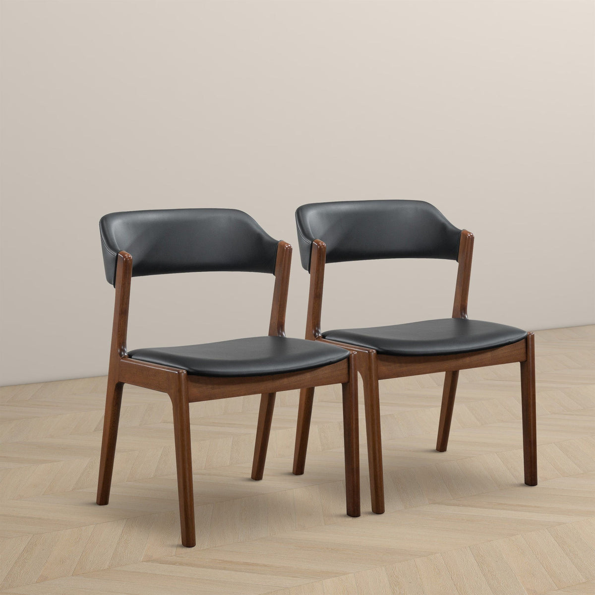 Enzo dining chairs set of 2 with black vegan leather seats and brown wood legs on Tampa Home & Garden Store