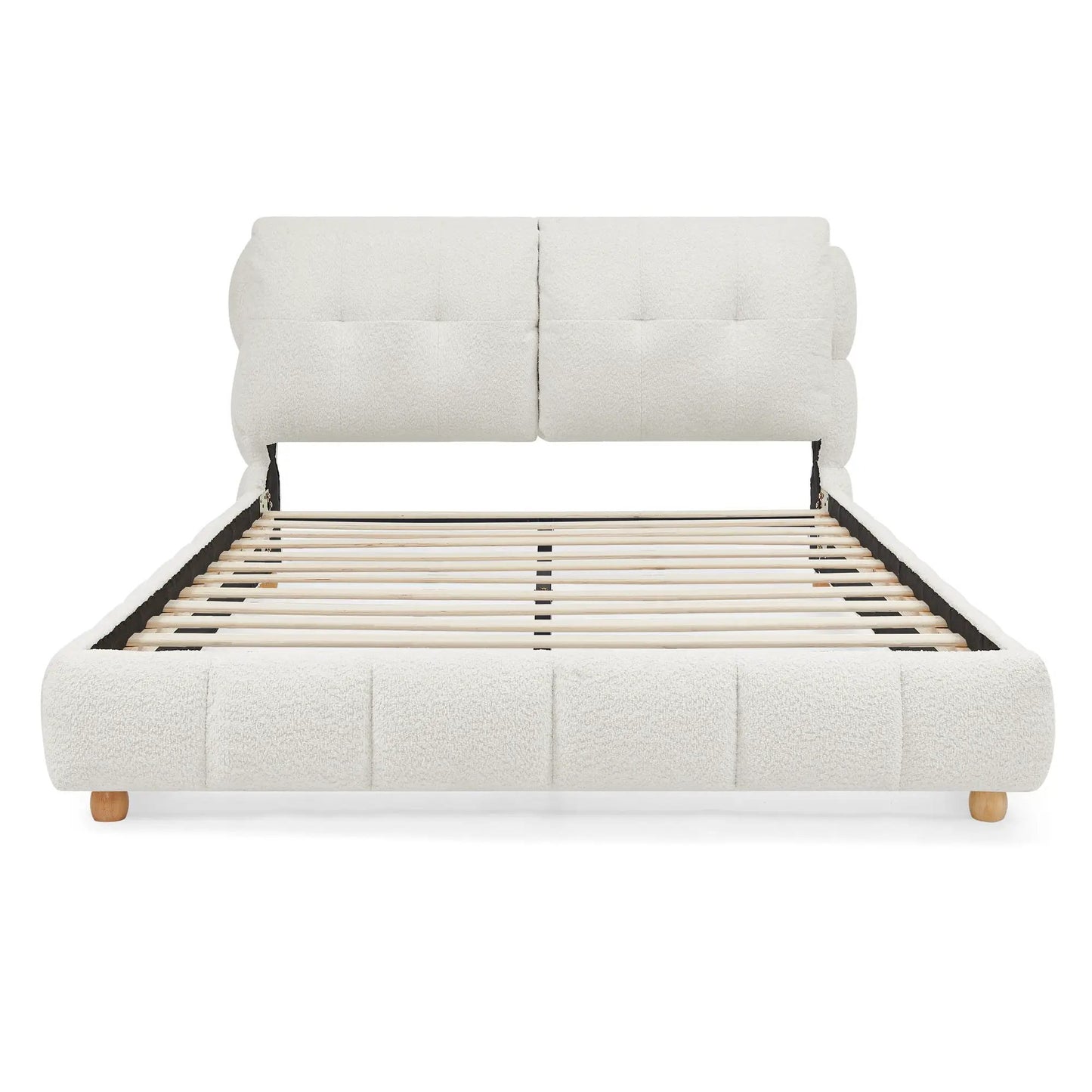 Platform bed with cream upholstery headboard and wooden legs by Unique Piece Furniture on Tampa Home & Garden Store