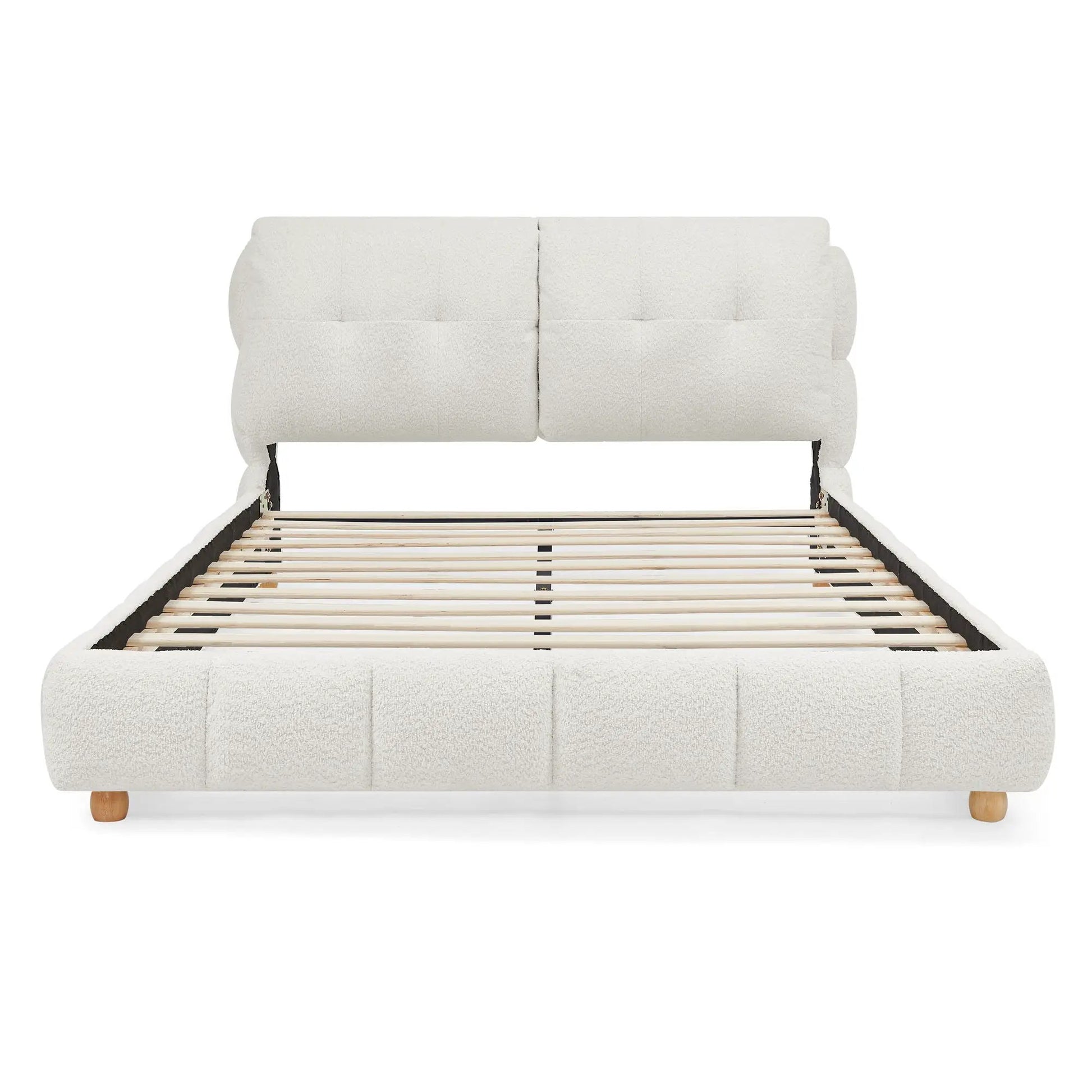 Platform bed with cream upholstery headboard and wooden legs by Unique Piece Furniture on Tampa Home & Garden Store