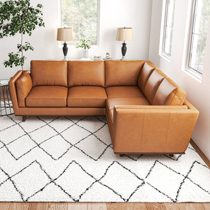Erman Corner Sofa Tan leather sectional by HouseOfZazla in a bright living room on Tampa Home & Garden Store