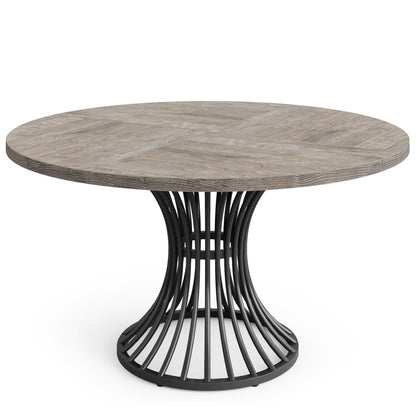 Round dining table for 4–6 with gray woodgrain tabletop and sculpted black metal base on Tampa Home & Garden Store