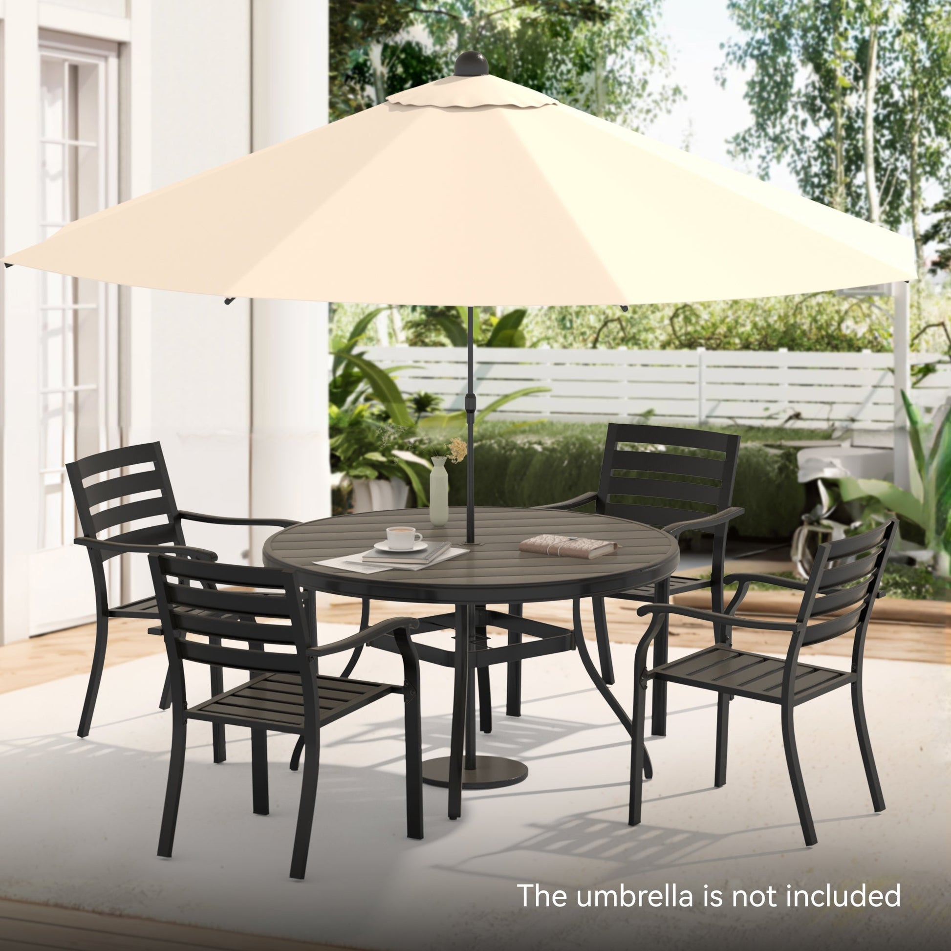 5-piece outdoor dining set with round metal table and 4 stackable black chairs under a beige umbrella on Tampa Home & Garden Store