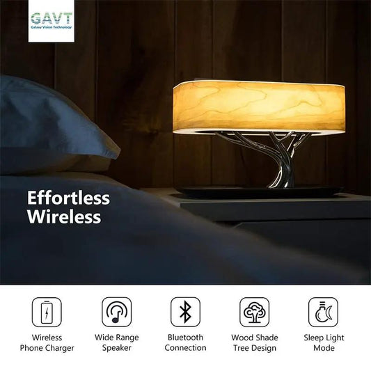 Dimmer LED Table Lamp with Bluetooth Speaker on bedside, amber shade, sculpted metal tree base on Tampa Home & Garden Store