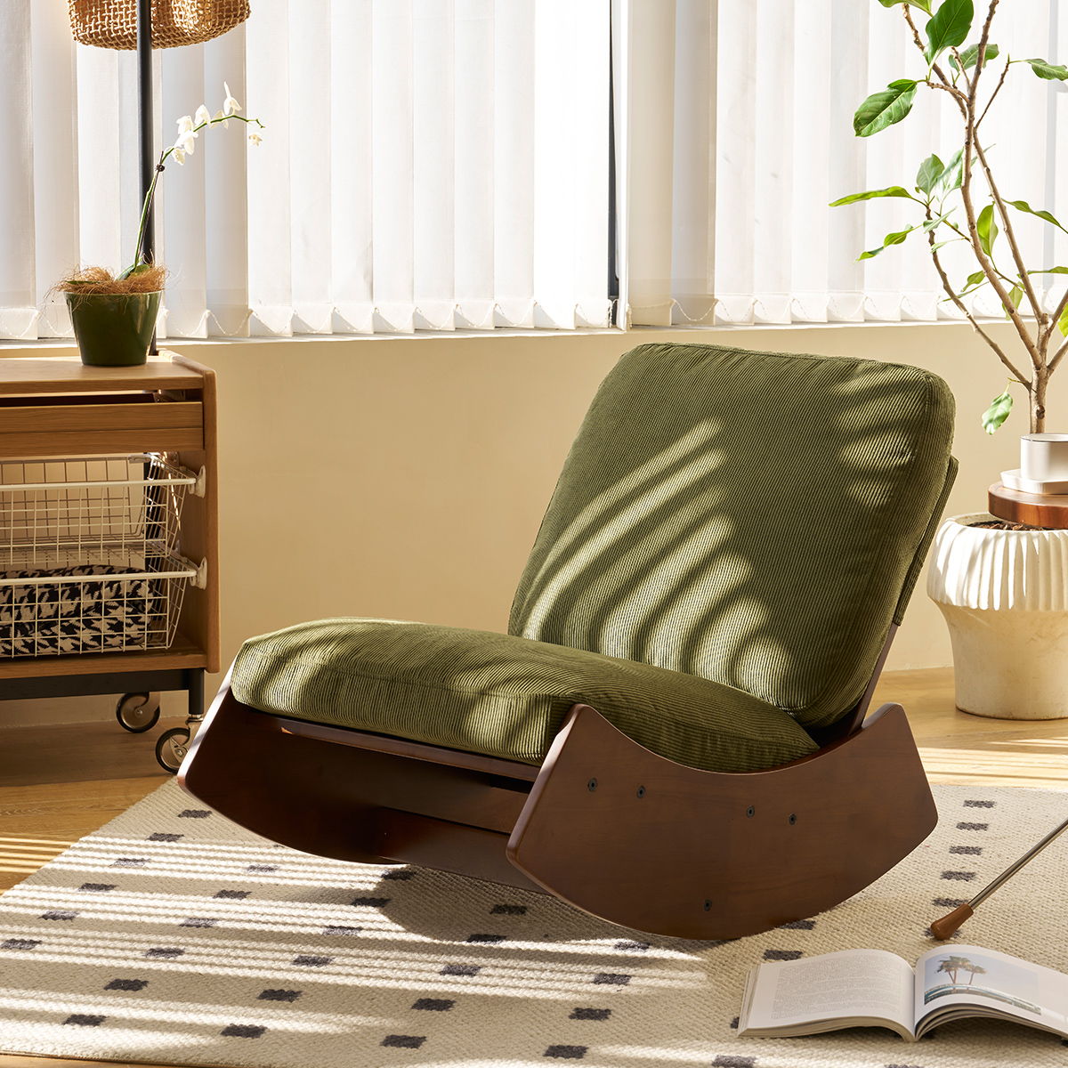 Upholstered glider rocking chair with solid wood curved base in green fabric on Tampa Home & Garden Store