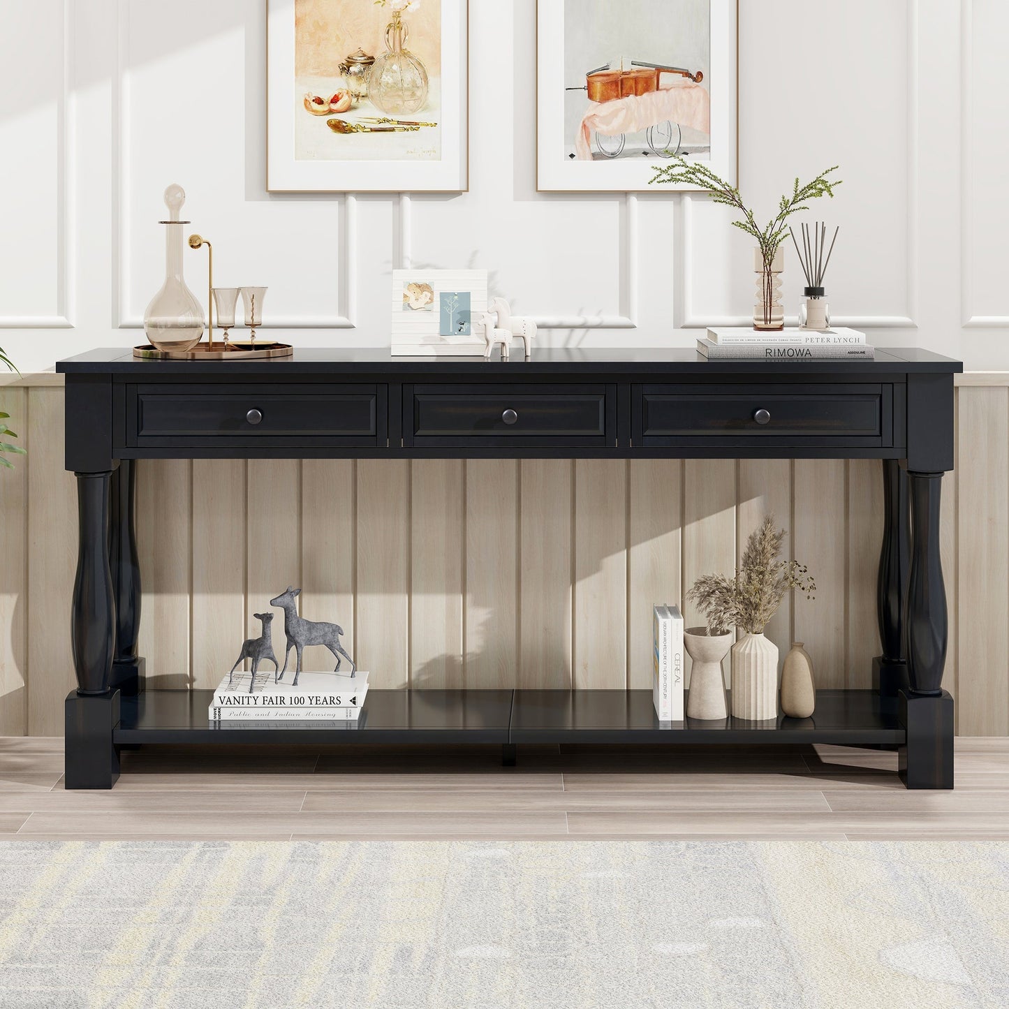 TREXM 63-inch long black console table with three drawers and lower shelf, styled with glass decanter, candlesticks, and framed art on Tampa Home & Garden Store