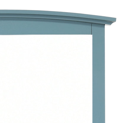 Elegant wall mirror with blue wood veneer frame by HouseOfZazla, curved top molding on Tampa Home & Garden Store