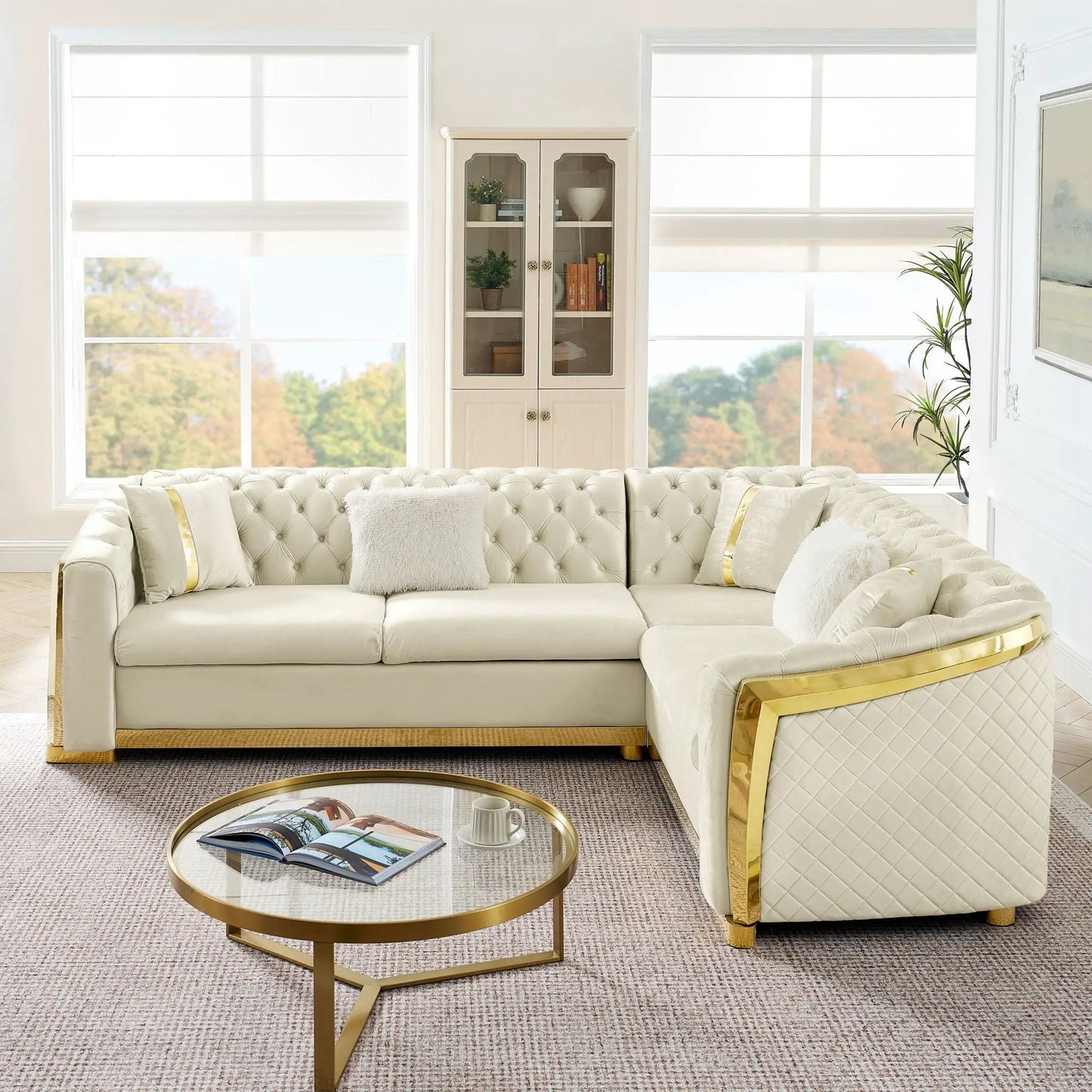 L-shaped Chesterfield sectional sofa in cream leather with stainless steel accents on Tampa Home & Garden Store
