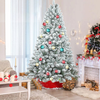 4FT flocked Christmas tree with pine cones and snowy PVC, red and turquoise ornaments on Tampa Home & Garden Store