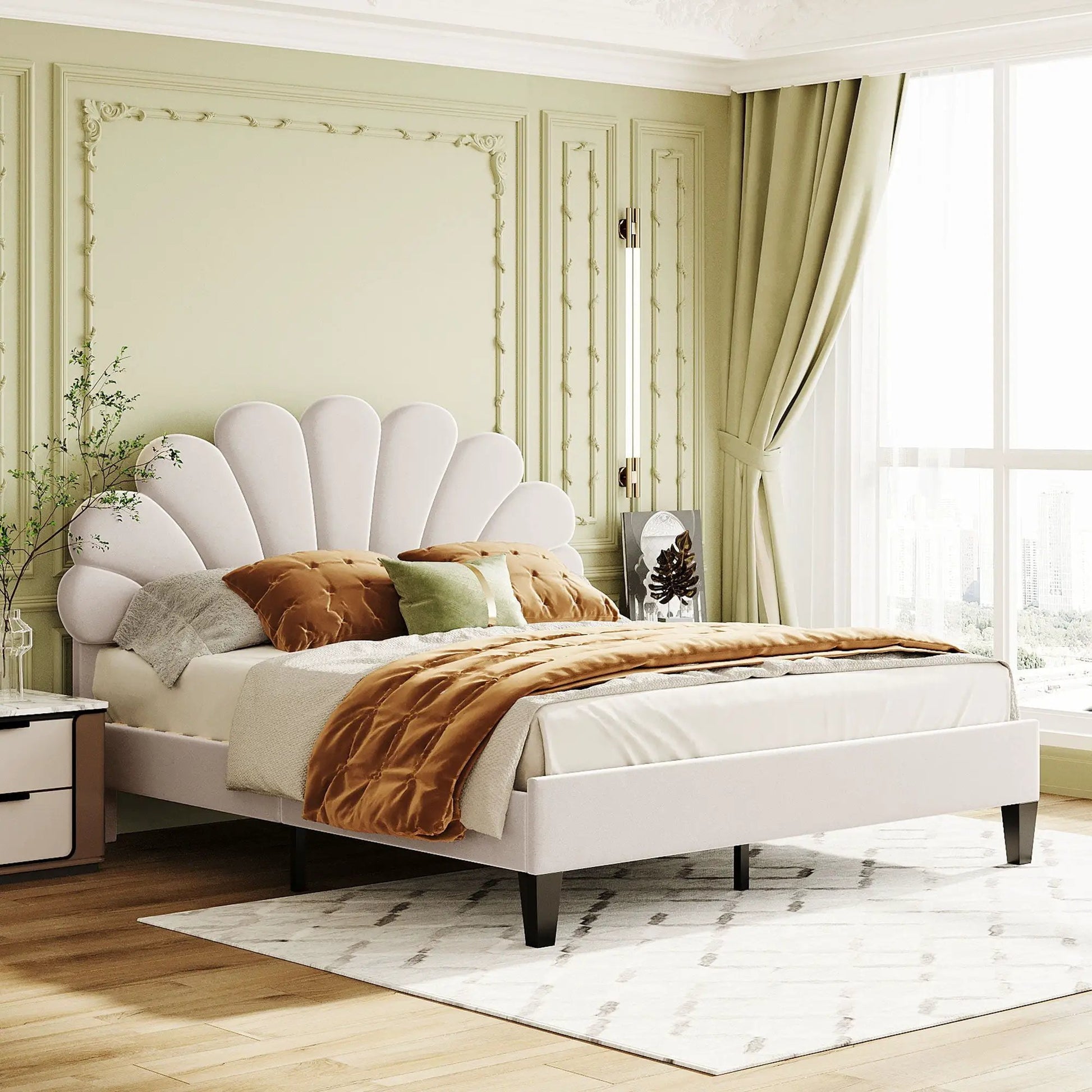 Upholstered platform bed with flower-pattern cream headboard and plush bedding in bedroom on Tampa Home & Garden Store