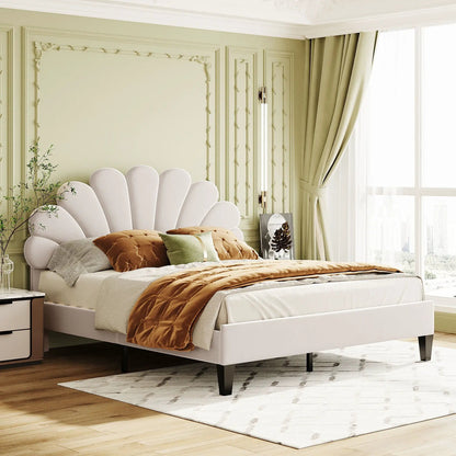 Upholstered platform bed with flower-pattern cream headboard and plush bedding in bedroom on Tampa Home & Garden Store