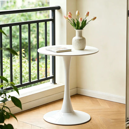 Round white dining table with tulip-style pedestal base and pink tulip vase on top on Tampa Home & Garden Store