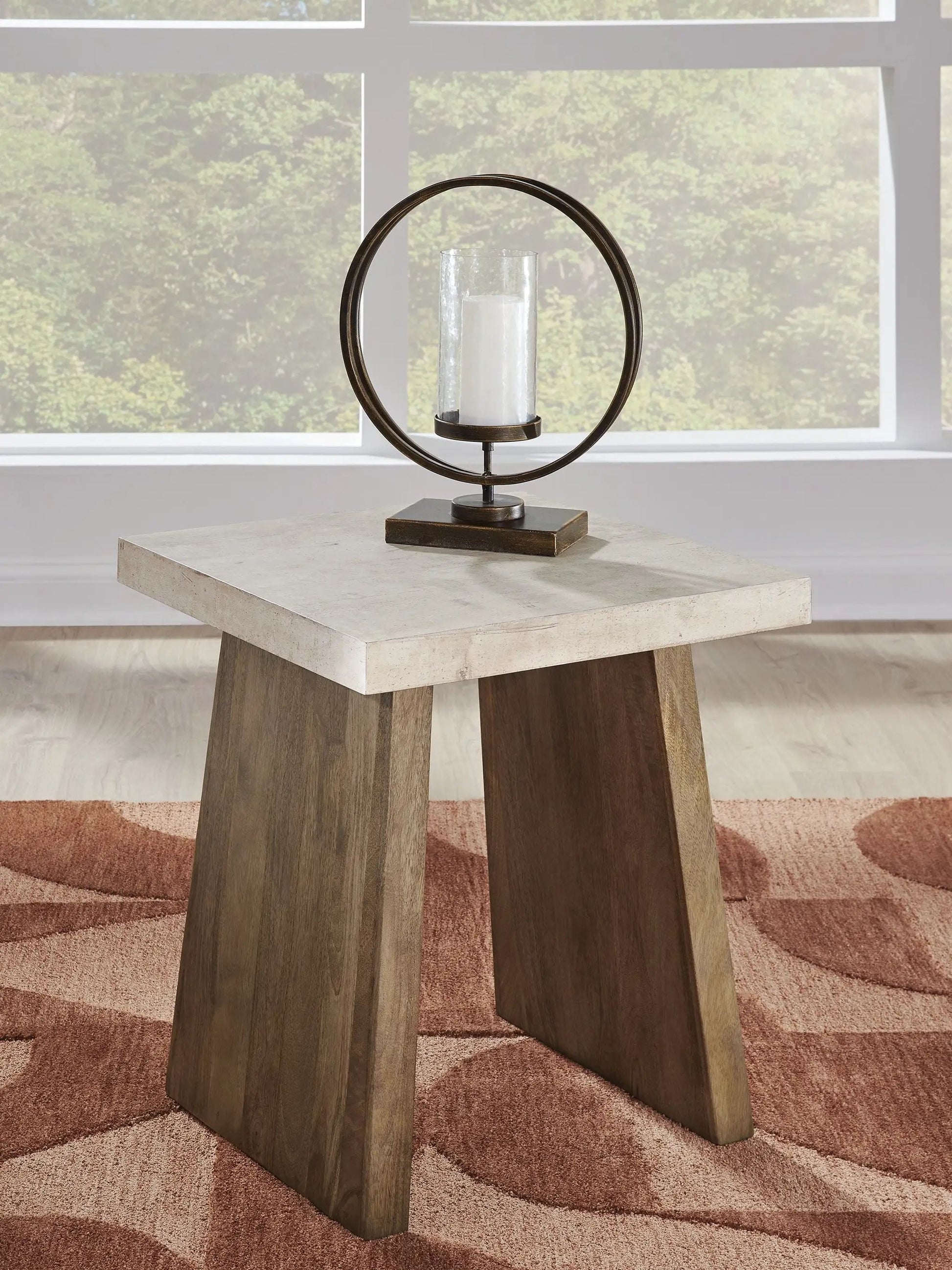 Brendalhouse Rectangular Table circle bronze ring centerpiece and glass hurricane candle on Tampa Home & Garden Store
