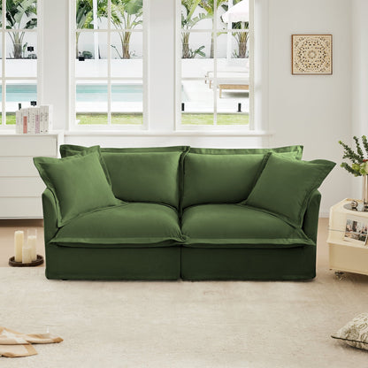 Modern Slipcovered 2-Seat Sofa by HouseOfZazla in green with cushions in a white living room on Tampa Home & Garden Store