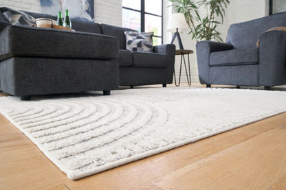 Lambworth area rug, white textured shag with concentric circle pattern in a living room on Tampa Home & Garden Store