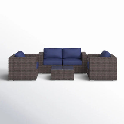 3-piece wicker outdoor seating set with blue cushions and coffee table HouseOfZazla on Tampa Home & Garden Store