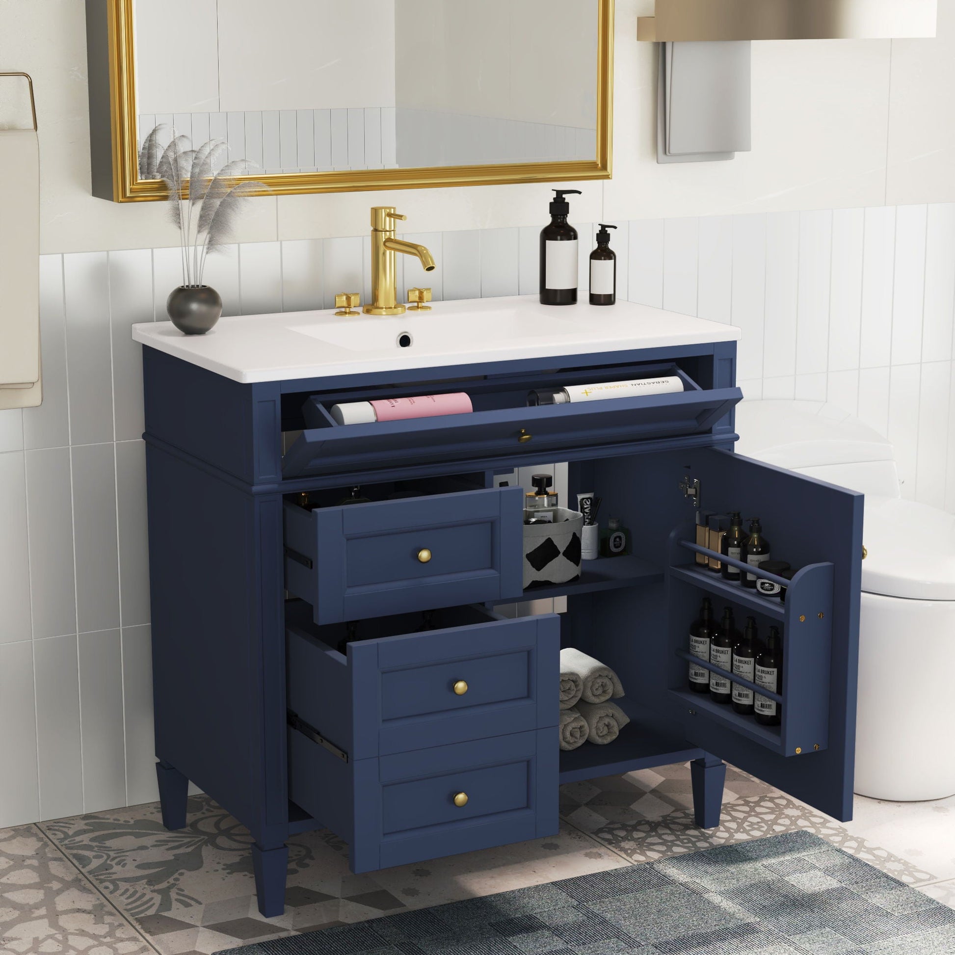 Blue bathroom vanity with white top sink, gold faucet, 2 drawers and tip-out drawer on Tampa Home & Garden Store