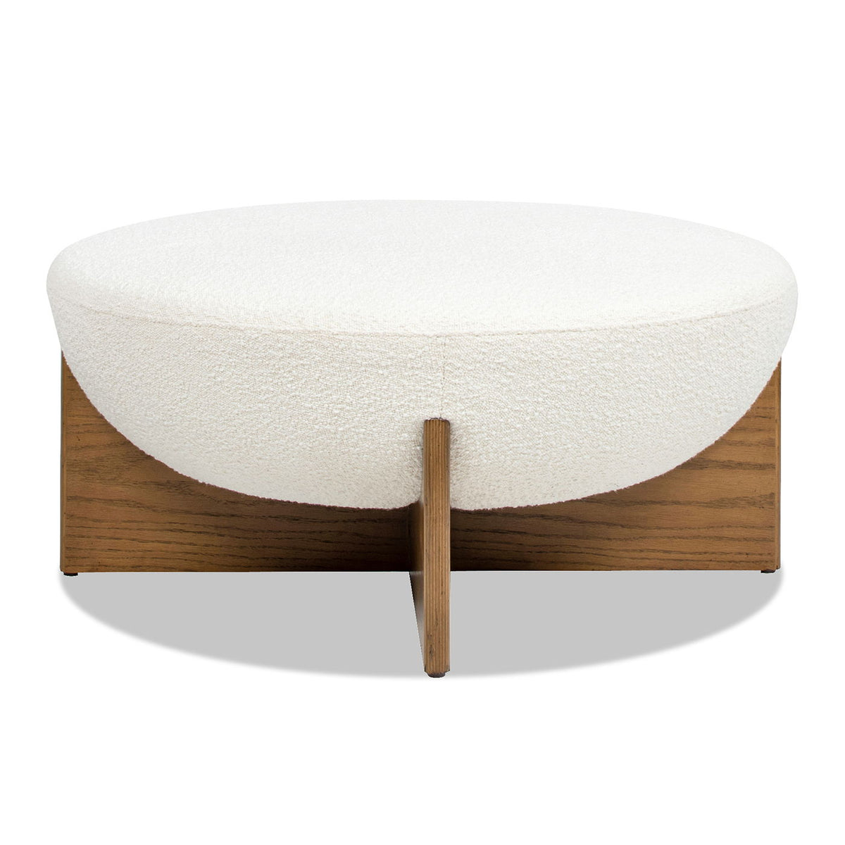 Round white boucle upholstered ottoman on a wooden platform base on Tampa Home & Garden Store