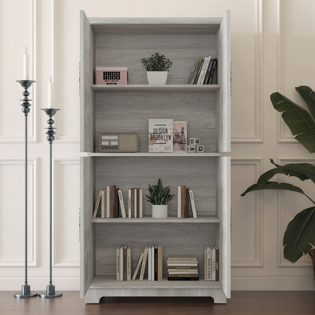 Modern gray wood sideboard buffet with open shelving, books and a white potted plant on Tampa Home & Garden Store