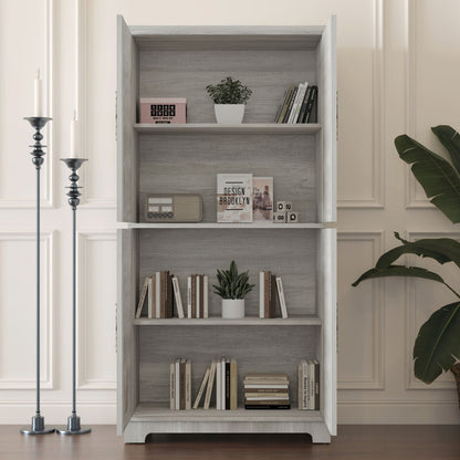 Modern gray wood sideboard buffet with open shelving, books and a white potted plant on Tampa Home & Garden Store
