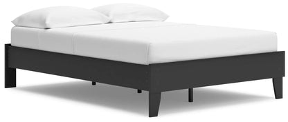 Socalle platform bed by Unique Piece Furniture in dark wood with white mattress and two pillows on Tampa Home & Garden Store