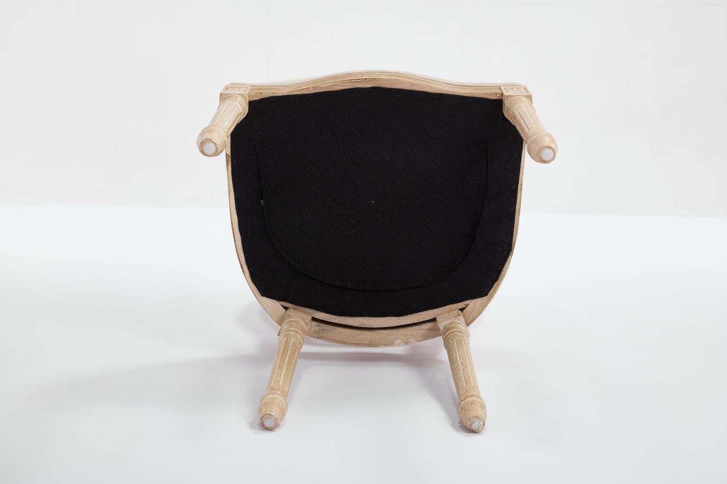 French Country dining chair with light wood frame and black upholstered back, rear view on Tampa Home & Garden Store
