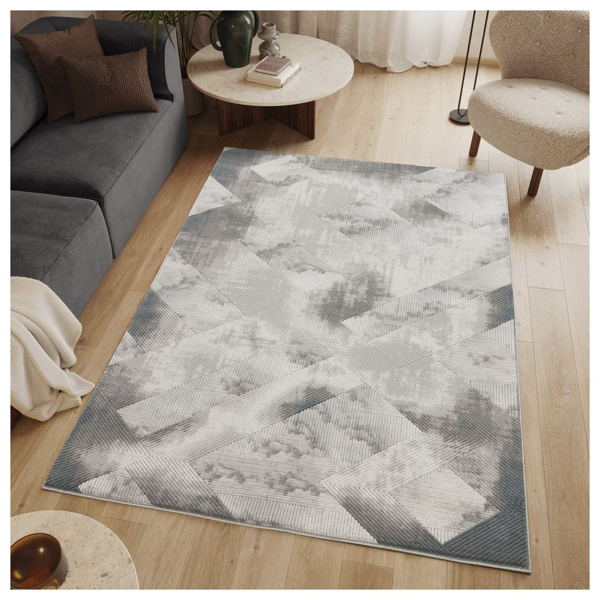 Gray modern area rug by HouseOfZazla with 3D geometric texture in subtle grayscale tones on Tampa Home & Garden Store