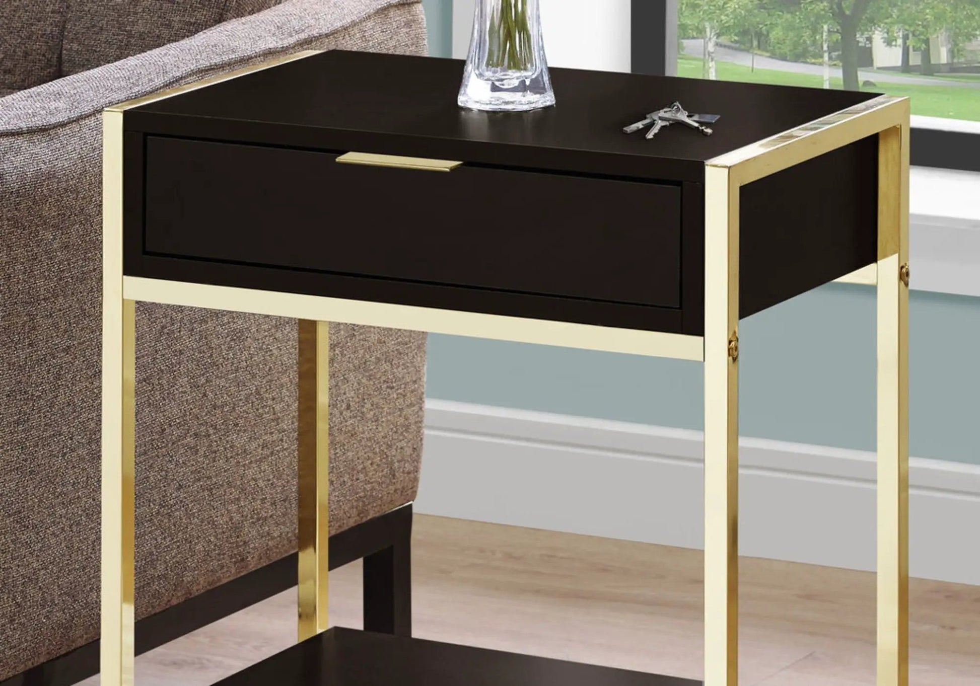 Accent side table with black finish, spacious tabletop and gold metal frame with storage drawer on Tampa Home & Garden Store