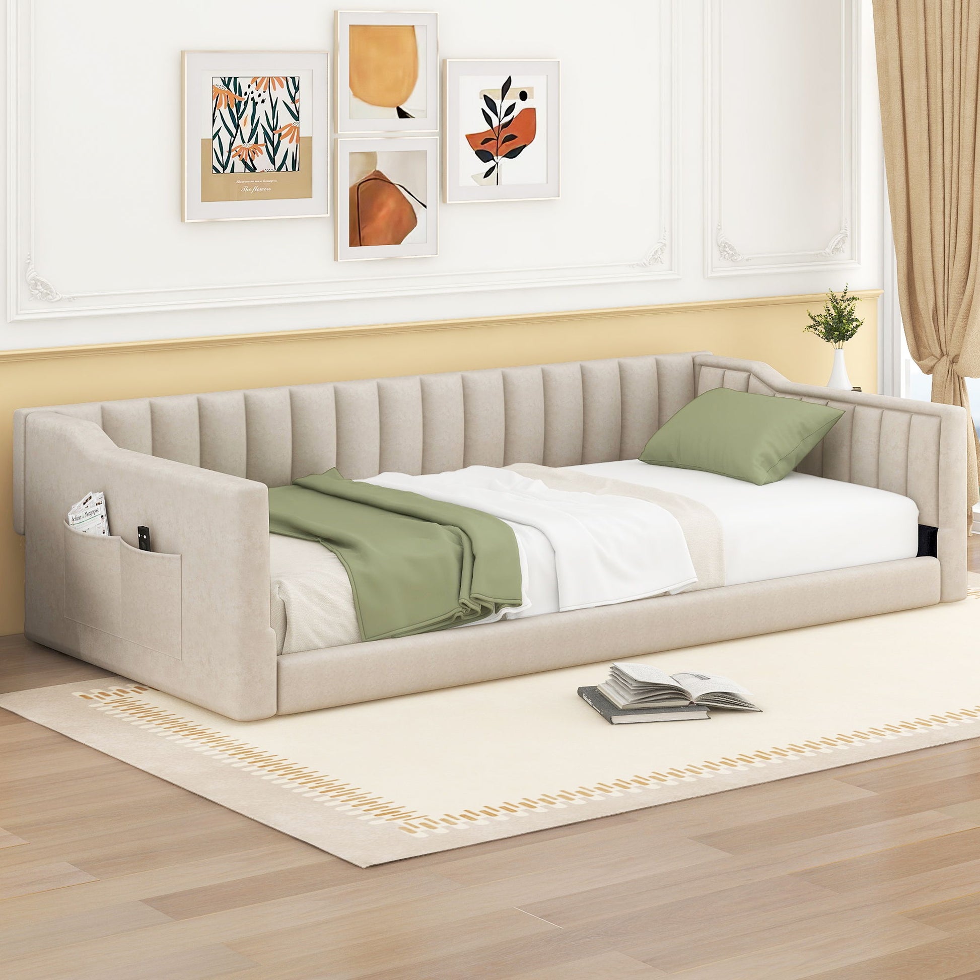 Beige upholstered daybed with side storage pocket and green pillows in a modern living room on Tampa Home & Garden Store