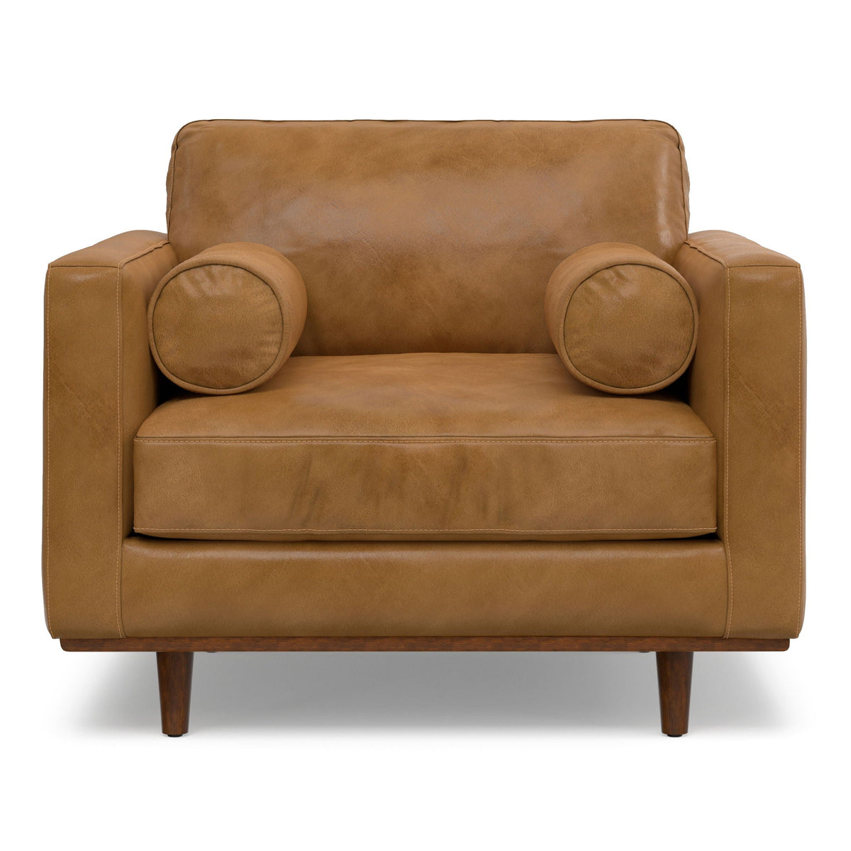 Wide brown leather arm chair with removable cushions and rounded arm bolsters, wood legs on Tampa Home & Garden Store