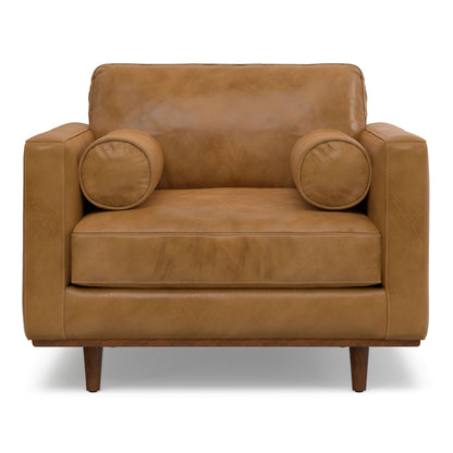 Wide brown leather arm chair with removable cushions and rounded arm bolsters, wood legs on Tampa Home & Garden Store