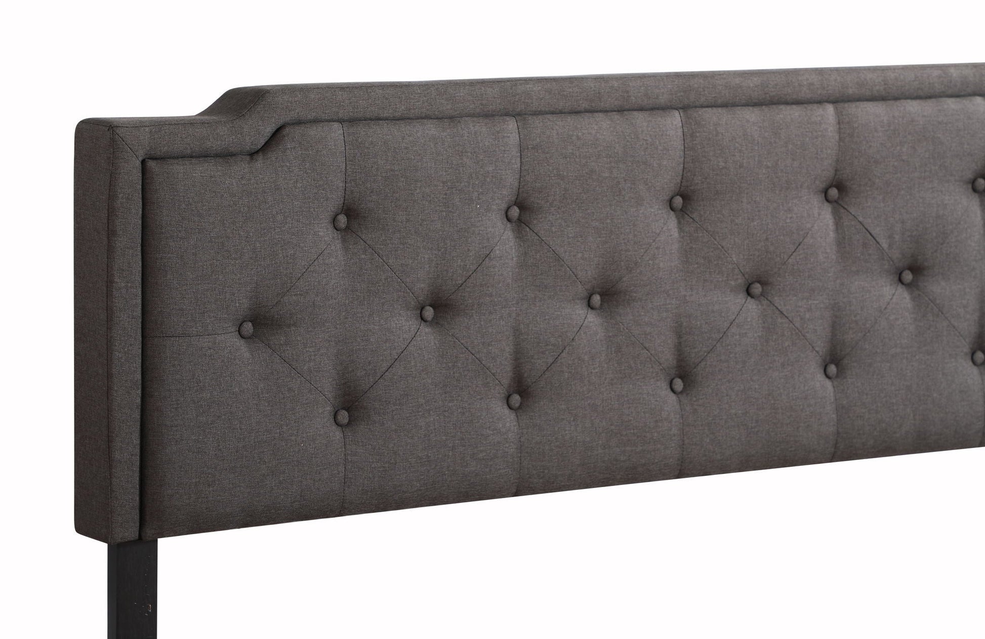 Gray button-tufted upholstered headboard with diamond tufting and dark wood leg on Tampa Home & Garden Store