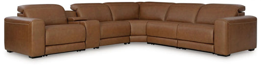 Magic Man reclining sectional by Unique Piece Furniture in tan leather with padded arms on Tampa Home & Garden Store