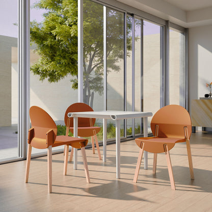 4-piece outdoor chair set with orange polypropylene seats and oak legs around a white table on Tampa Home & Garden Store