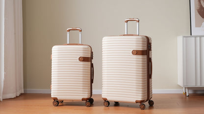 4 Piece Luggage Set champagne hard-shell suitcases with brown trim, 2 suitcases on wheels on Tampa Home & Garden Store