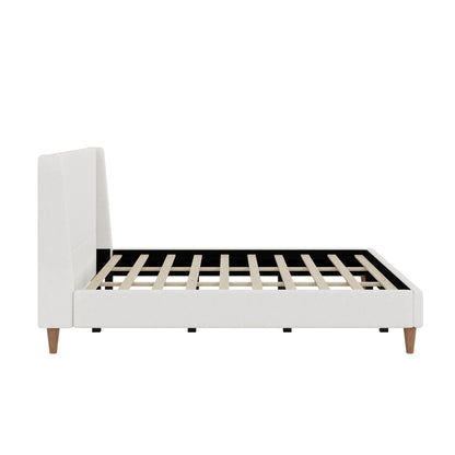 Upholstered modern platform bed with wingback headboard in white fabric, wooden legs on Tampa Home & Garden Store