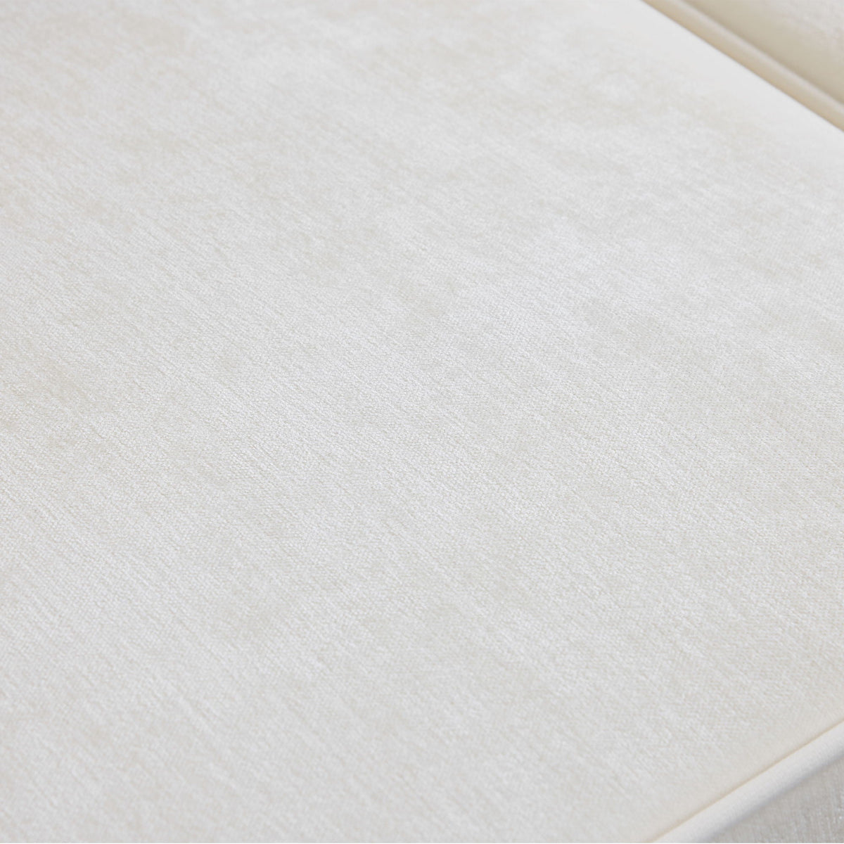 L-shaped sectional sofa white fabric upholstery close-up texture on Tampa Home & Garden Store