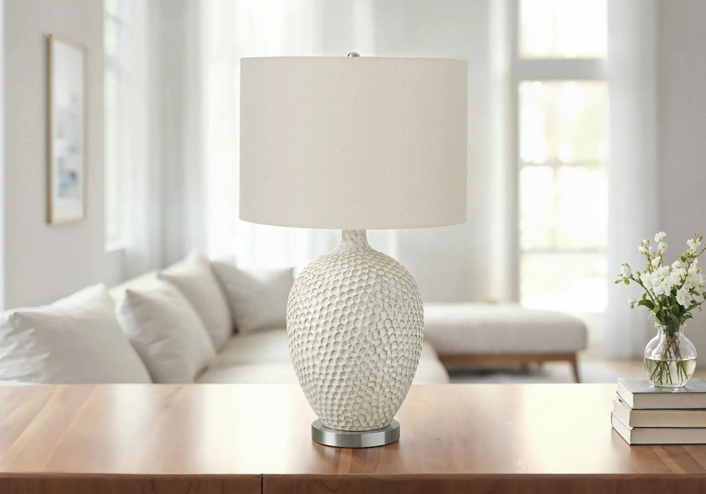Ceramic table lamp in cream with a textured scale-pattern base and beige fabric shade by Unique Piece Furniture on Tampa Home & Garden Store