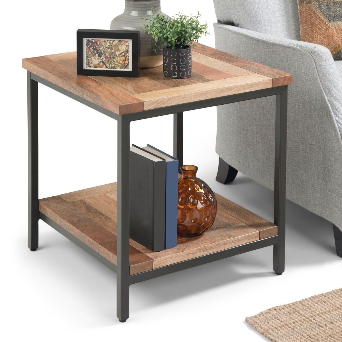 Solid mango wood coffee table with a light brown finish and black metal frame, two tiers on Tampa Home & Garden Store