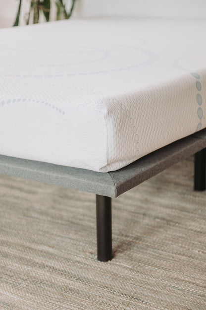 8-inch memory foam mattress by HouseOfZazla with white cover and dotted pattern on a metal frame on Tampa Home & Garden Store