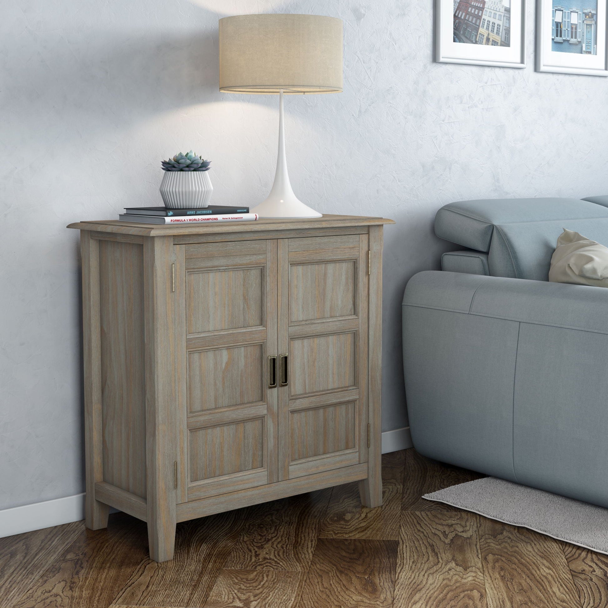 Burlington Handcrafted Low Storage Cabinet by HouseOfZazla; light wood, paneled doors, lamp atop on Tampa Home & Garden Store