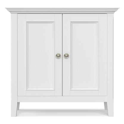 Amherst handcrafted low storage cabinet with double paneled doors, white finish, molding on top on Tampa Home & Garden Store